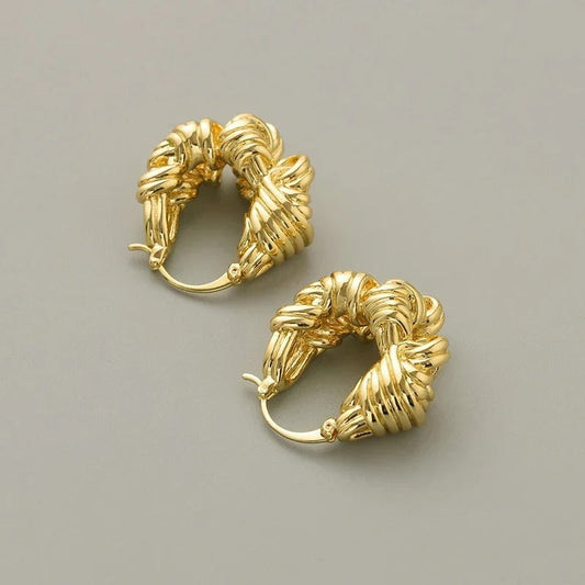 Pendientes de nudo grueso de oro