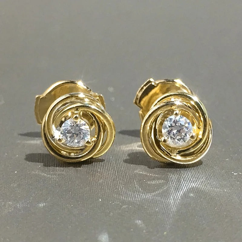 Pendientes de espiral de oro brillante