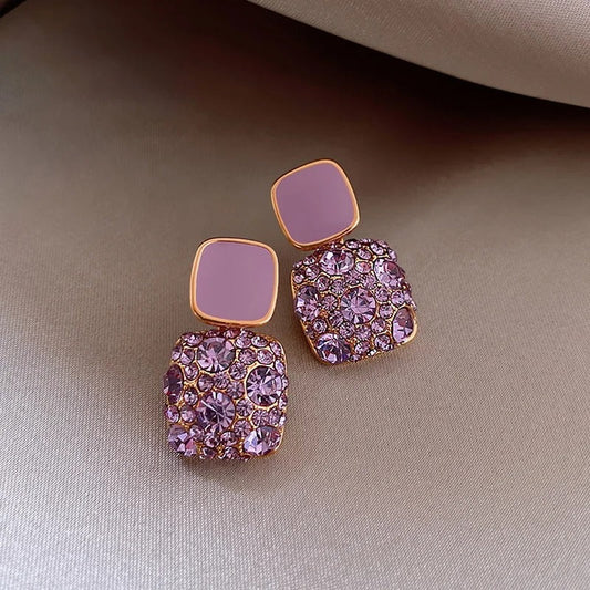 Pendientes retro morados brillantes
