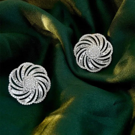 Pendientes de plata con remolinos brillantes