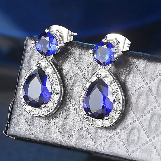 Pendientes vintage de piedras preciosas azules y piedra blanca radiante