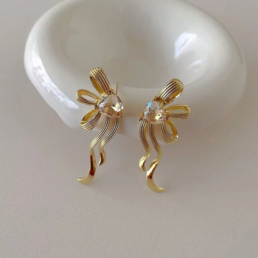 Pendientes de borlas de oro en forma de corazón