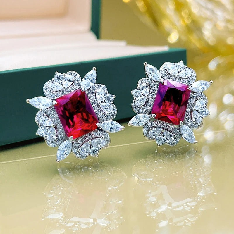 Pendientes florales con gemas rojas de plata