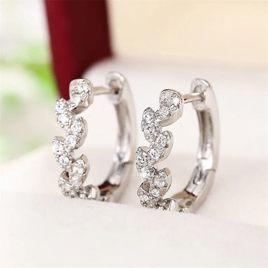 Pendientes de hoja brillante de plata