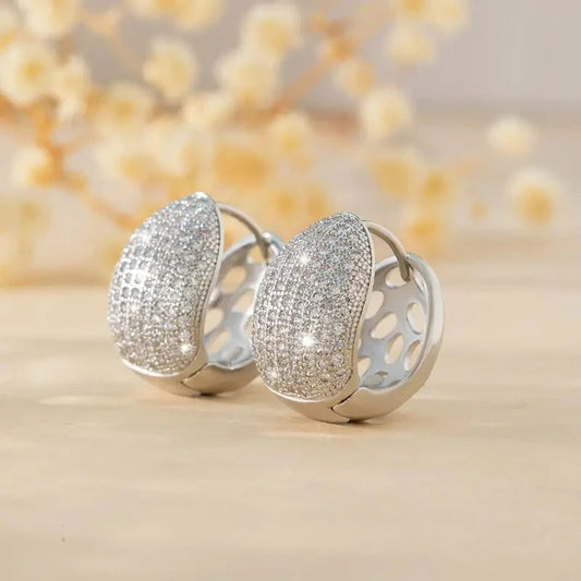 Pendientes de plata curvados con brillo