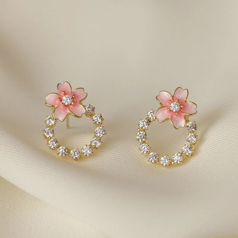 Pendientes de botón con flores rosas y doradas