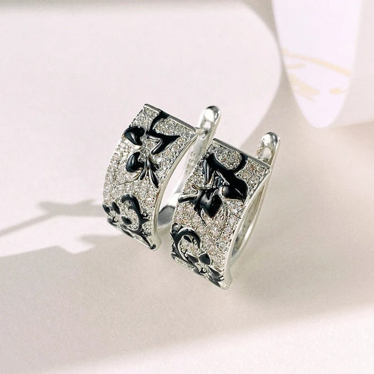 Pendientes de esmalte con flores negras de plata
