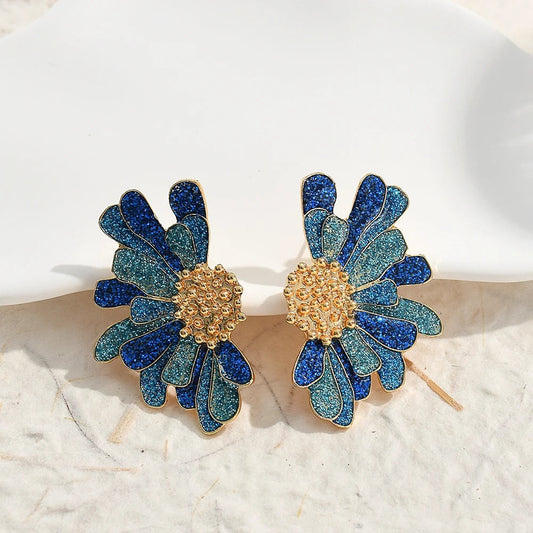 Pendientes vintage de oro con flores azules y brillantes