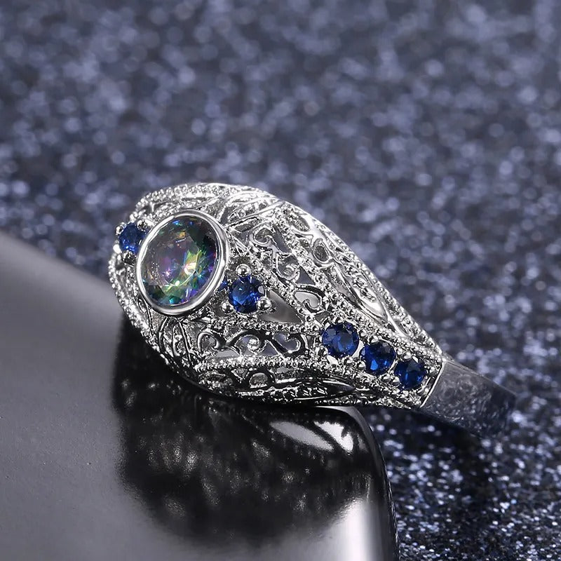 Anillo vintage de plata y cristal azul