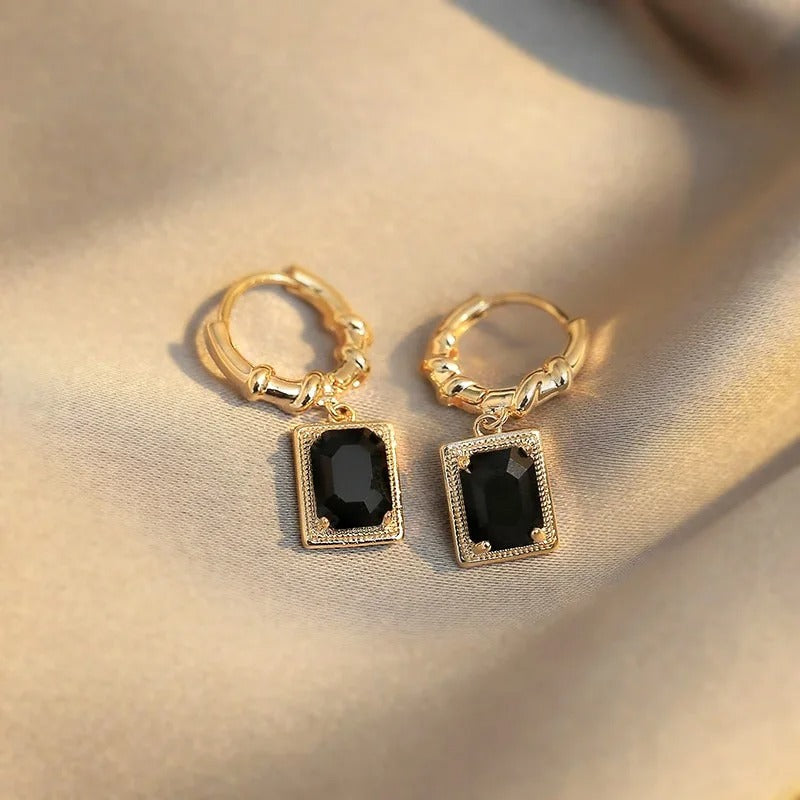 Pendientes colgantes de circonita negra dorada