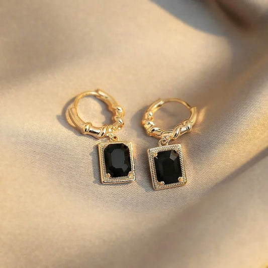 Pendientes colgantes de circonita negra dorada