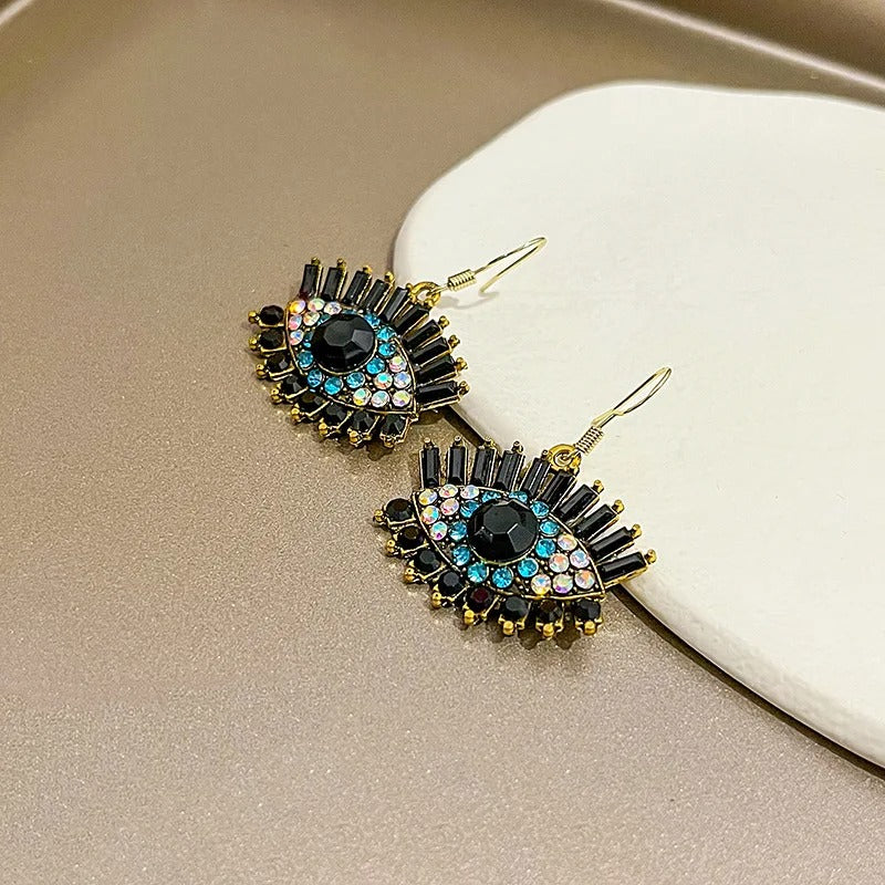 Boucles d'oreilles pendantes Classic Eye en cristal noir et bleu