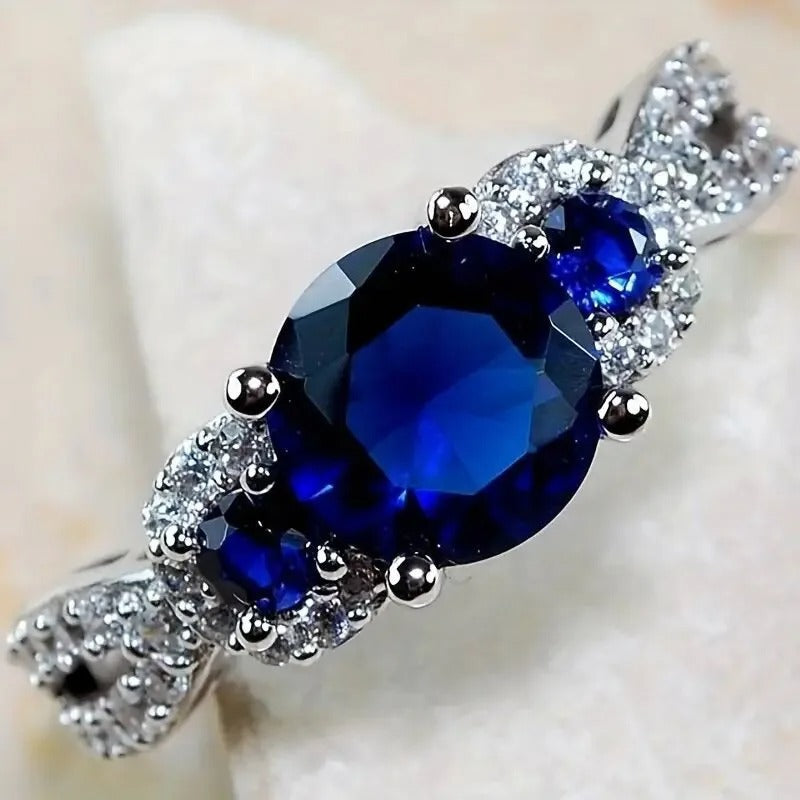 Anillo vintage de plata con piedras preciosas de color azul real