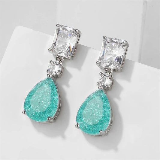 Pendientes colgantes de plata vintage con piedras preciosas verdes