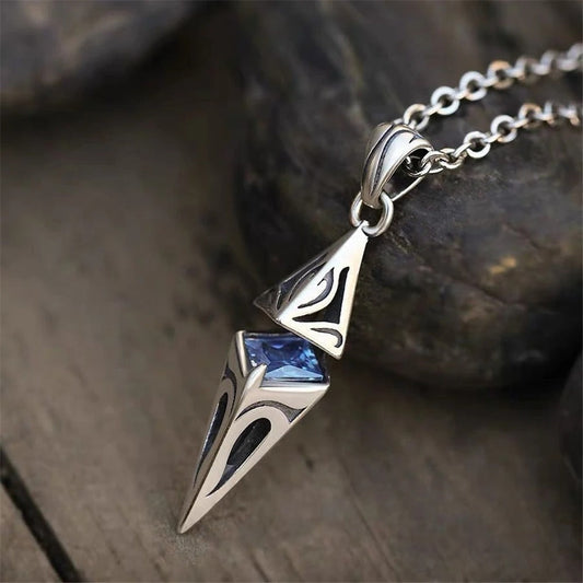 Collier vintage à pointes et pierres bleues