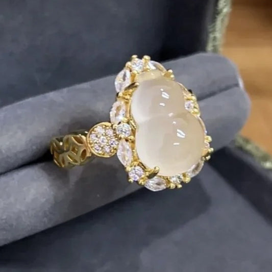 Timeless Gold & Moonstone Oval Cluster Diamond Ring