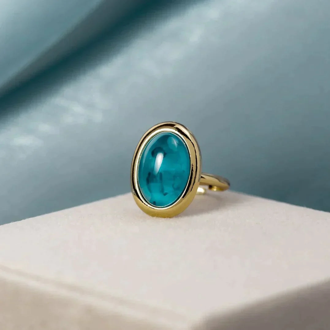 Bague en or avec pierre bleue 